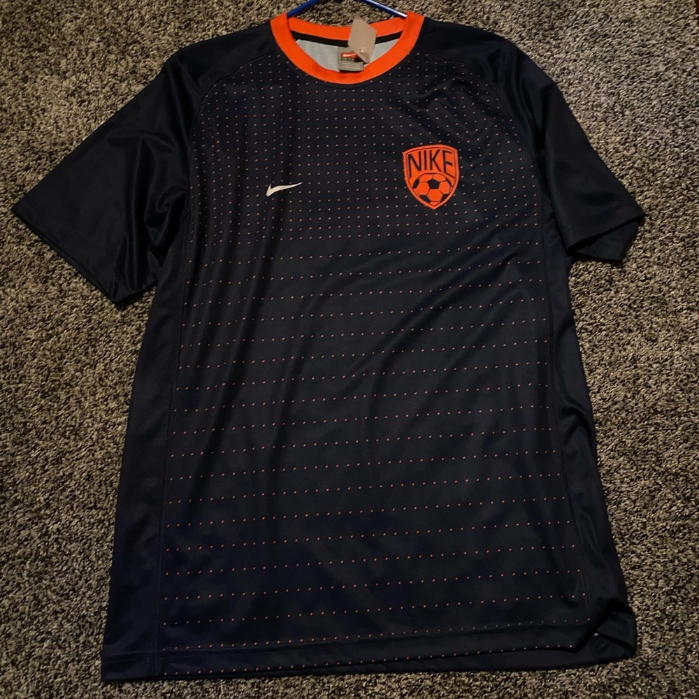Navy blue and orange athletic shirt